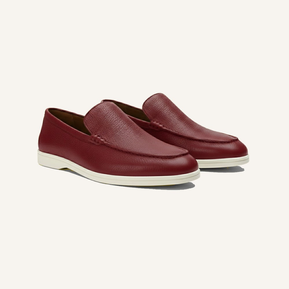 Maroon cow leather loafer by San Valier, with a white sole and tonal stitching.
