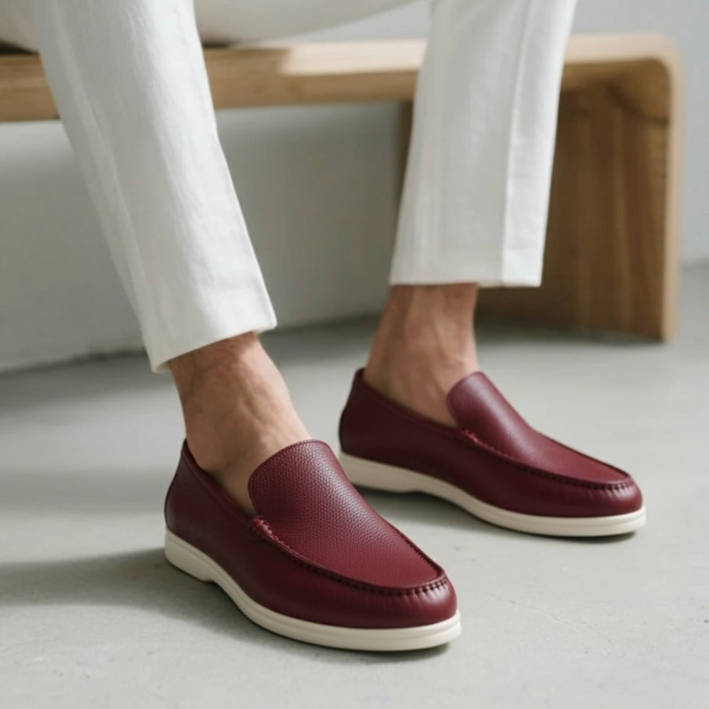 Burgundy cow leather loafers by San Valier featuring a textured upper and white sole.