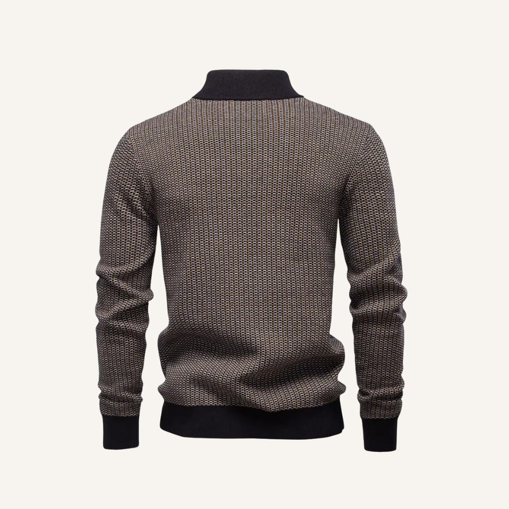 Brown knit quarter-zip sweater by SanValier, featuring an all-over geometric pattern and a black ribbed collar, cuffs, and hem.