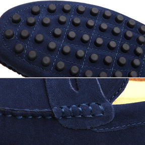 Blue suede driver loafer by SanValier with black rubber tread detail and decorative stitching.